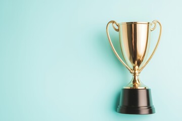Fototapeta premium Golden trophy on light blue background - achievement and success symbol