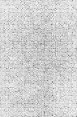 A dense array of small black dots creates a textured surface with subtle gradations.
