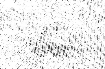 A dense textured field of scattered dark dots dominates a bright white background.