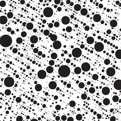 Fototapeta premium Numerous black circles create a dynamic flowing across a white background.