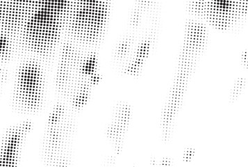 A grayscale portrait showcases a person&rsquo;s face created entirely from small densely packed dots.