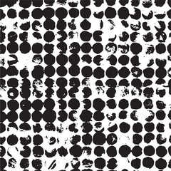 Fototapeta premium A dense textured of overlapping black and white circular shapes.