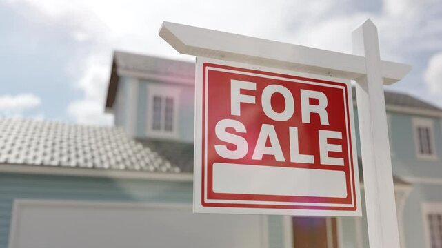 4k Zoom of For Sale Real Estate Sign and New House.