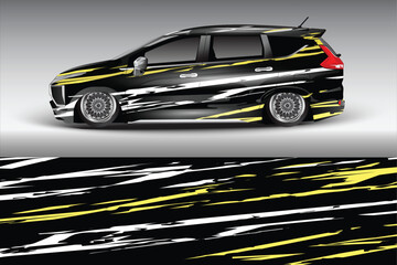 Stylish black vehicle with dynamic yellow graphics