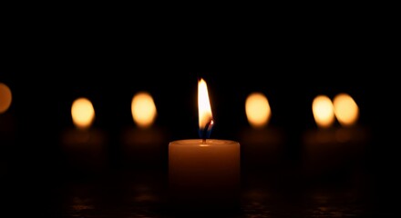 Single Candlelight in the Dark: A Symbol of Hope and Remembrance