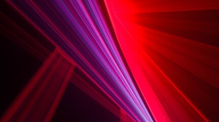 Fototapeta premium Abstract red and purple light streaks create a dynamic and vibrant background.
