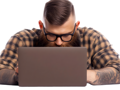 Photo of a Serious Man with a Beard and Glasses Working on Laptop