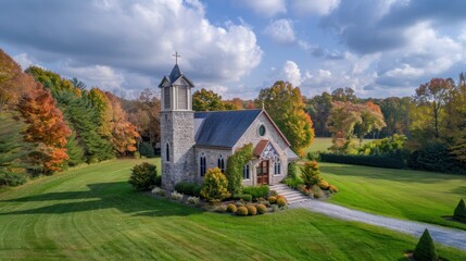 Fototapeta premium Autumnal stone church nestled in a park-like setting