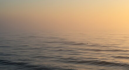 Fototapeta premium Ocean Waves Under Fog at Sunrise
