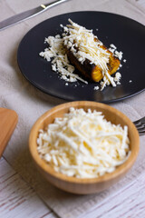 Baked plantains with white cheese