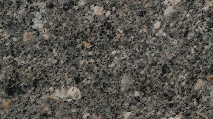 Abstract background texture of natural granite stone with speckled patterns in earthy tones, ideal for design, decor, or architectural materials.