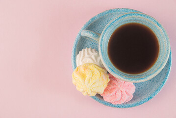 Colorful Marshmallows and Coffee on Pink Background