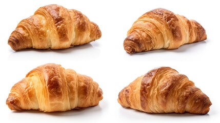 Four golden croissants on white background