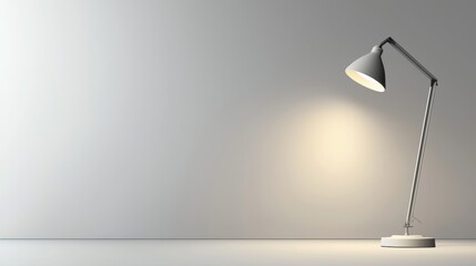 A minimalist desk lamp illuminates a simple, empty workspace, showcasing modern design.