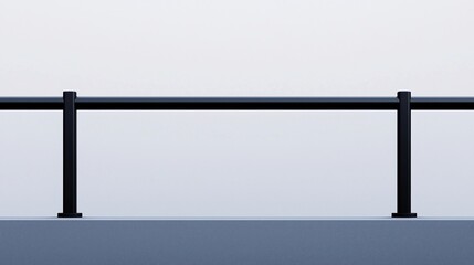 Obraz premium Minimalist image of a black metal railing against a pale sky, emphasizing simple lines and modern design.