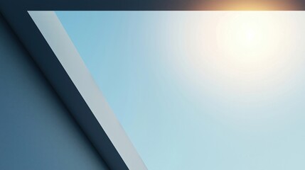 Minimalist view of a skylight with sunlight streaming through, highlighting modern architectural lines against a clear blue sky.