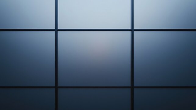 Frosted glass panels arranged in a grid pattern with a soft blue gradient, creating a modern and minimalist architectural design.