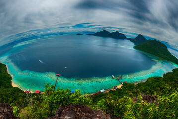 Turquoise ocean sea water white wave splashing deep blue sea. Bird eye view monster wave splash on...
