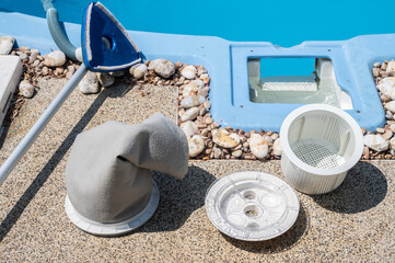 A part of pool skimmer filter before changing. Pool skimmers are filters that capture floating...