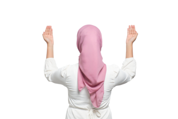 Back view. Young Asian Muslim woman raising hands and praying to god isolated on transparent background