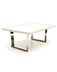 White table with silver legs and a silver frame