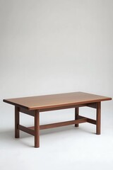 Wooden table with a brown top sits on a white background