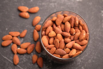 roasted almonds. Almonds are part of the Prunoidae subfamily of the Rosaceae family. This plant is in the same classification as peaches in the subgenus Amygdalus within Prunus. Prunus dulcis