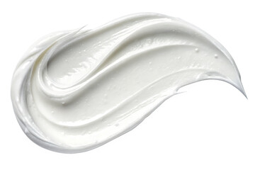 A close up of a swirl of white cream or lotion against a dark black background in a studio shot