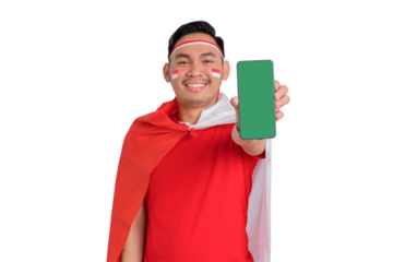 Cheerful young Asian man showing a blank screen mobile phone isolated on transparent background. Indonesian independence day concept
