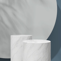 Pair of marble columns with a muted blue background, showcasing subtle marble texture details.