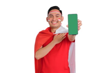 Cheerful young Asian man showing a blank screen mobile phone isolated on transparent background. Indonesian independence day concept