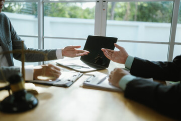 Professional lawyer advising client on legal contractsensuring justice, compliance, and financial...