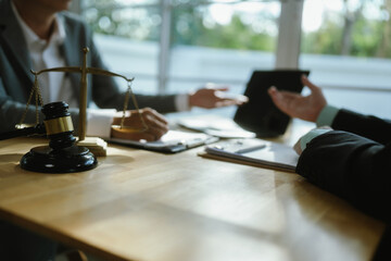 Professional lawyer advising client on legal contractsensuring justice, compliance, and financial...