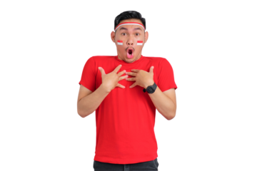 Shocked young Asian man celebrating Indonesian independence day keeps hands on chest with open mouth isolated on transparent background