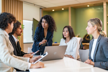 Leadership training, executive communication and team development in progress with diverse...