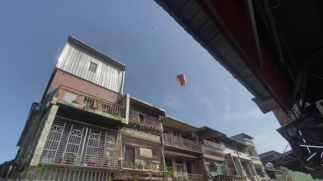 A flying lantern in the blue sky in Shifen Taipei handheld shot