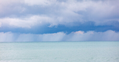 A stormy sky with a large cloud in the middle