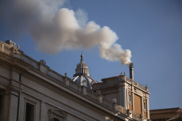 Fototapeta na wymiar Historic moment as white smoke billows from Vatican chimney announcing the new pope’s election in the heart of Rome. Generative ai