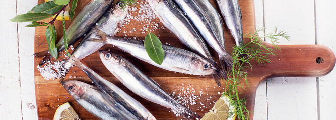 Fresh sprat fish on board.