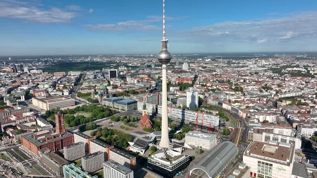 City of Berlin, Germany from above.Aerial view of cityscape showing architectural landmarks Fernsehturm TV Tower and Berlin Cathedral by day. Drone Flight over Alexanderplatz TV Tower, Sunflairs circa