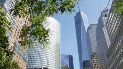 New York City Manhattan, Downtown Financial District architecture, United States. One World Trade Center skyscraper building, USA. American urban street. Freedom tower in NYC. Battery park. Brookfield