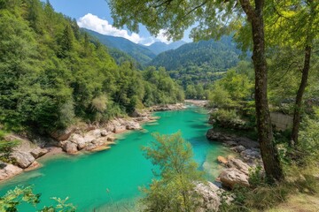 Turquoise river winding through lush valley