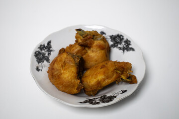 Delicious fried chicken dish on white background