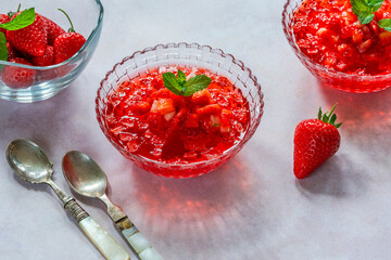 Homemade fruit jelly with fresh strawberries
