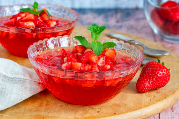 Homemade fruit jelly with fresh strawberries