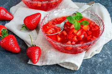 Homemade fruit jelly with fresh strawberries