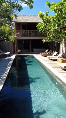 Serene Tropical Villa Retreat with Refreshing Pool and Lush Greenery on a Sunny Day Holiday