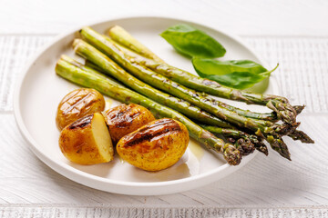 Grilled asparagus and golden baby potatoes