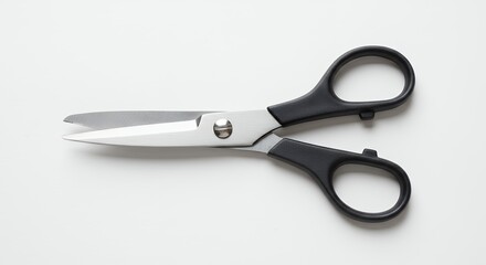 Fototapeta premium Open scissors on a bright white background isolated tool for cutting and trimming