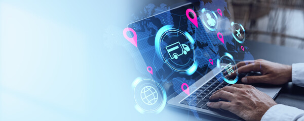 Digital logistics management interface with delivery icons on laptop screen in office concept.